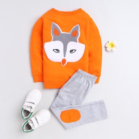 orange t-shirt and grey pant for baby girl